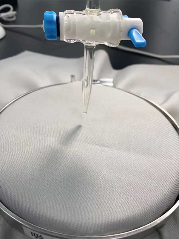 距離試驗(yàn)片10mm滴下